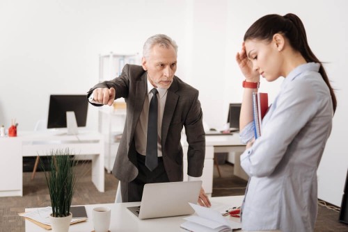 pretty-young-office-worker-bowing-her-head-embracing-documents-while-standing-semi-position-touching-foreheadea6b11a05e188196.jpg