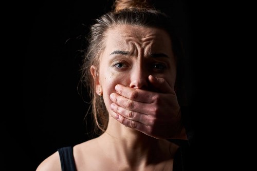 stressed-unhappy-scared-crying-woman-victim-fear-with-closed-mouth-dark-black6cfe24306f03ac64.jpg